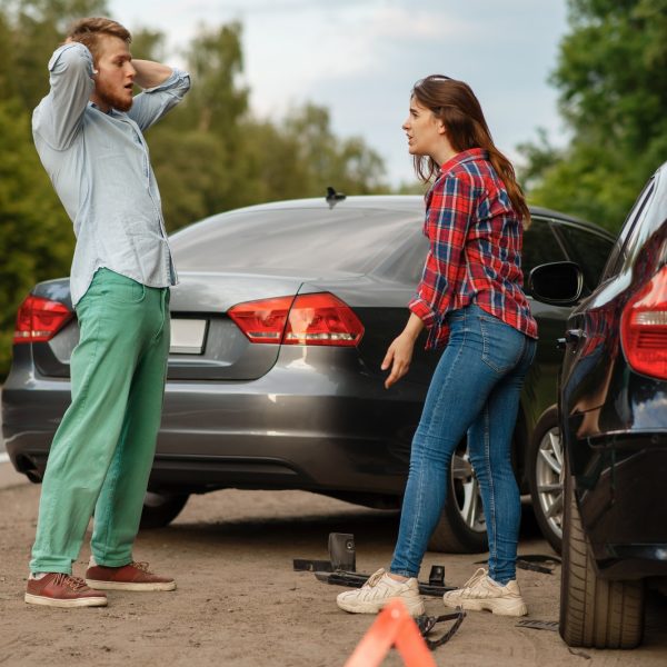 car-accident-on-road-man-and-woman-are-sorted-out.jpg